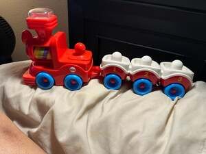 Fisher-Price Brilliant Basics Poppity Pop Train with 3 Numbered Stacking Cars